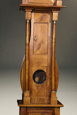 Alternative view of Mid 19th century French Empire styled tall case clock in cherry with bronze mounts