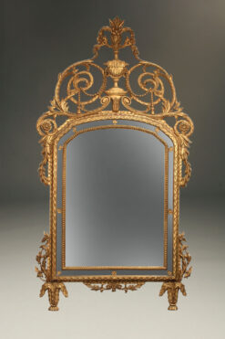 Piemonte mirror with carved gilded frame.