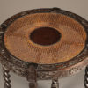 Antique English side table with caned top. Antique English side table with caned top.