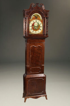 Mid 19th century English tall case clock with plum pudding mahogany case, circa 1860.