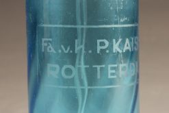 Blue seltzer water bottle from France dated 1938.