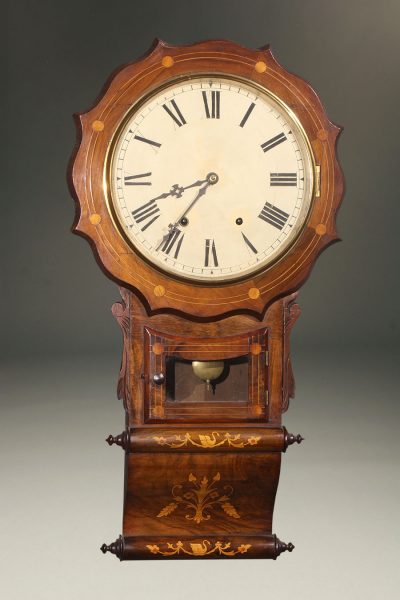 Late 19th century New Haven Clock Co. wall clock with walnut case ans charming inlay