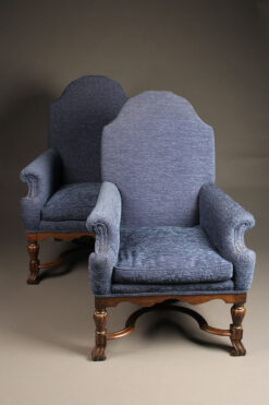 Pair of mid 19th century English arch back armchairs with nicely carved stretcher, circa 1850.