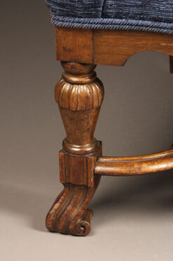 Pair of mid 19th century English arch back armchairs with nicely carved stretcher, circa 1850.
