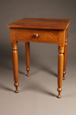 Very nice late 19th century cherry stand table with drawer and turned legs