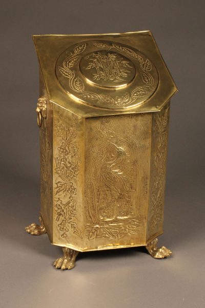 19th century English coal hod with iron liner, claw feet and brass repoussè