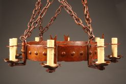 Late 19th century massive country French iron chandelier with 8 arms and reddish finish