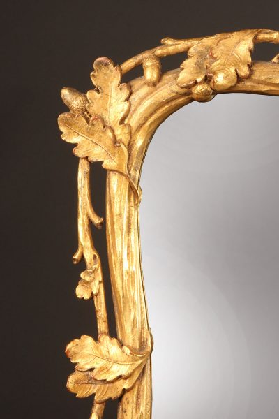 19th century French ornately carved and gilded mirror with oak leaf motif