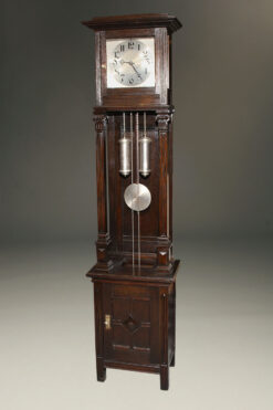 Oak German tall case clock with "open well"