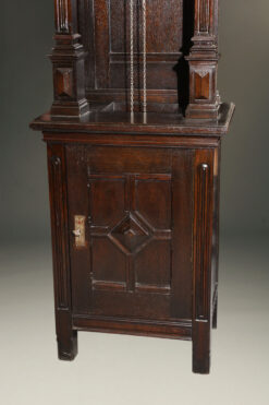 Oak German tall case clock with "open well"